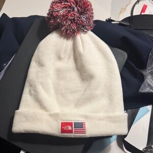 The North Face White Beanie with Red Pom and Flag